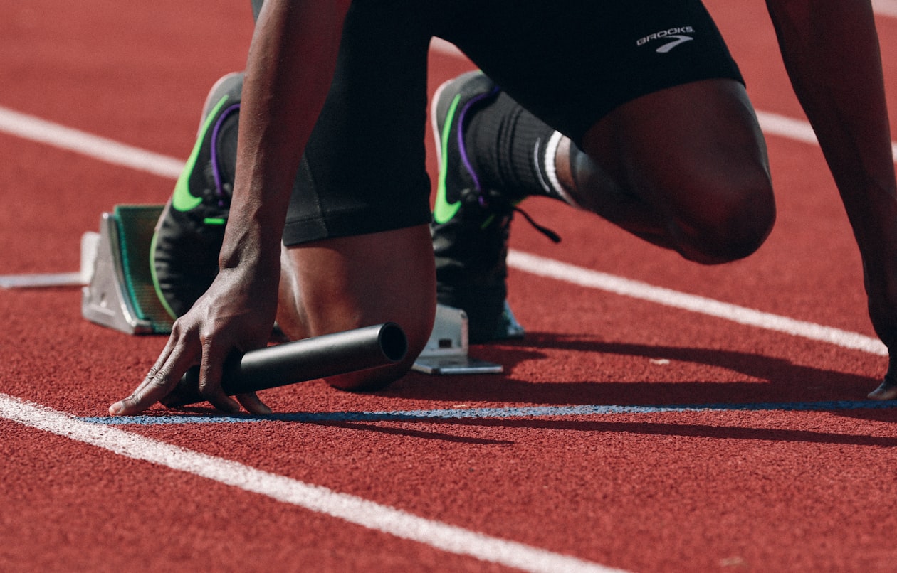 Track athlete at the starting blocks